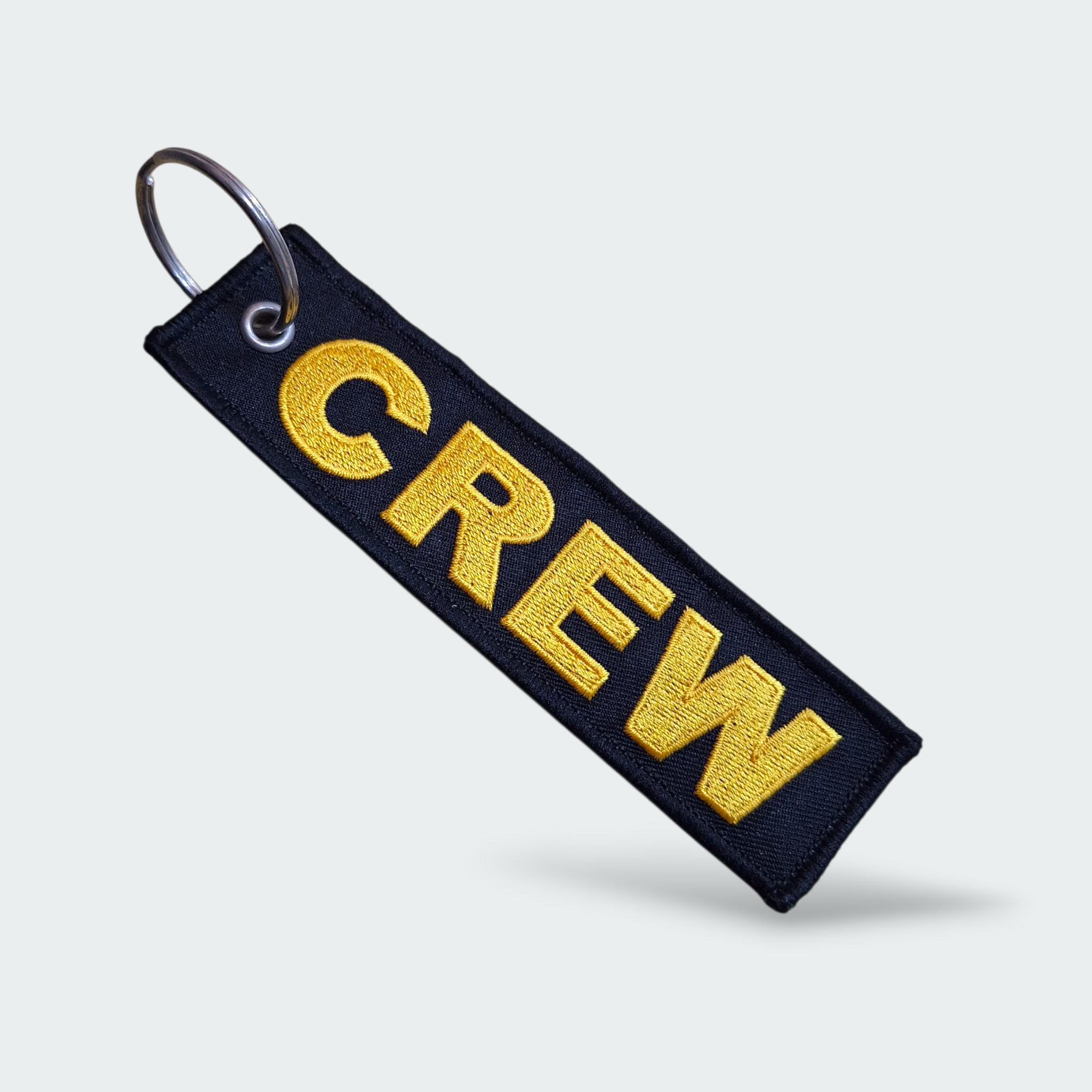 LLAVERO  CREW NEGRO CON AMARILLO