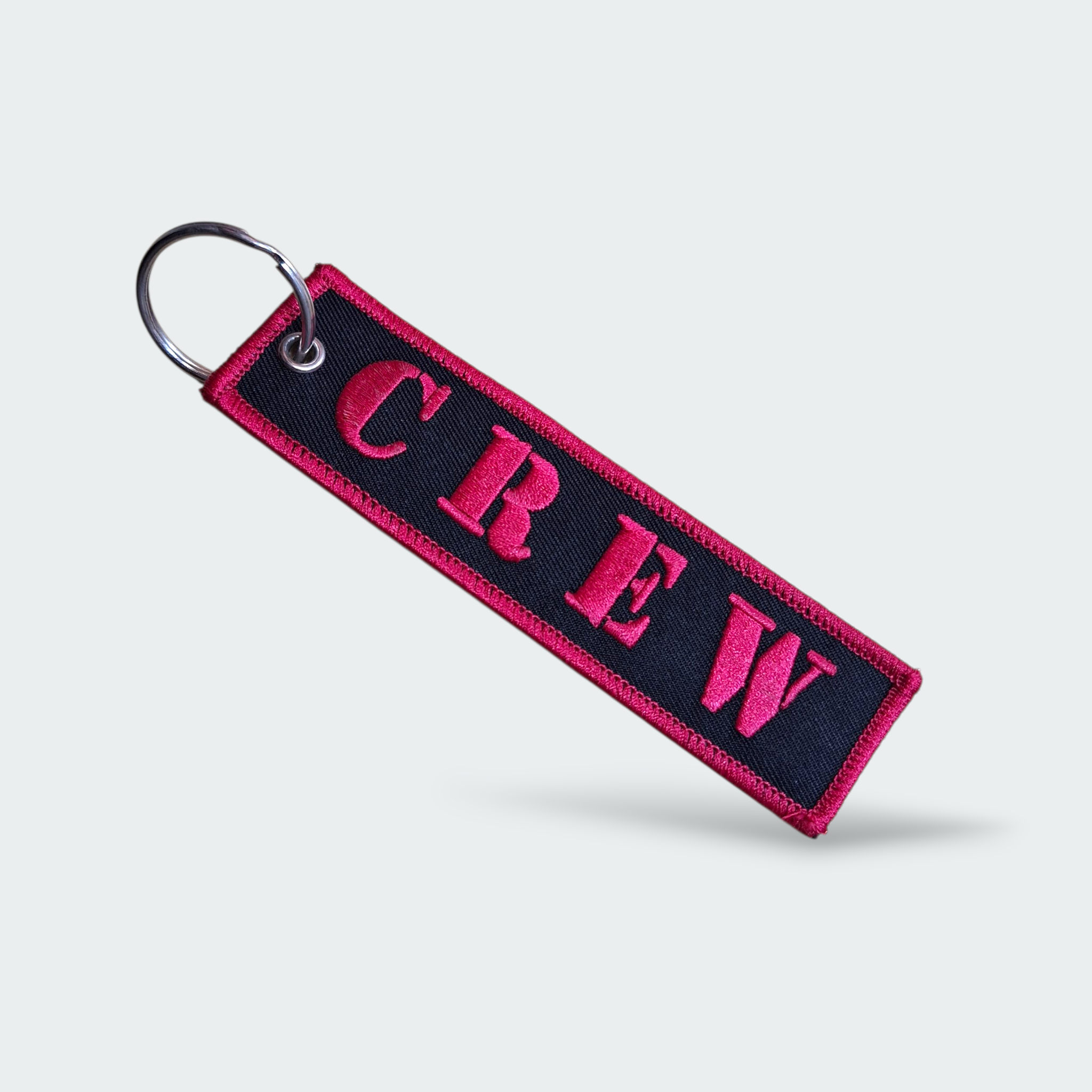 LLAVERO  CREW NEGRO BORDE ROSA