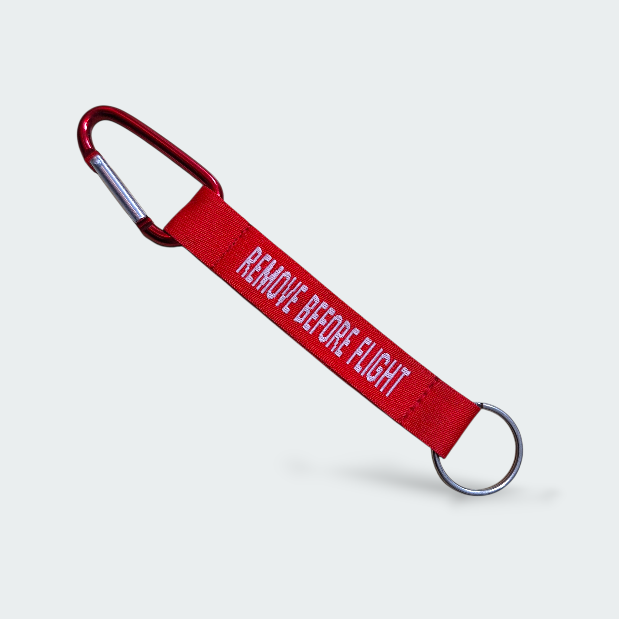 LLAVERO REMOVE BEFORE FLIGHT ARNÉS